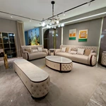 Cream Tufted Leather Sofa with Deep-Red High-Gloss Wood Side Panels